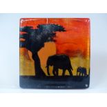 Caithness Glass paperweight depicting elephants,