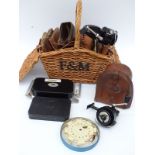 A collection of vintage leather cast wallets including Hardy empty leather reel box,