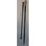 A silver knopped walking stick and one other