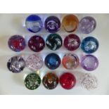 Sixteen Caithness Glass paperweights comprising Quicksilver, Fireball, Myriad, Moonflower, Journey,