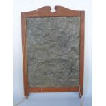 An Arts and Crafts pewter hammered panel,