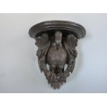 Indian / Sri Lankan carved and ebonised vulture wall bracket,