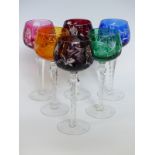 A harlequin set of six cut glass hock glasses