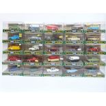 Twenty-five Corgi Classic Models diecast model cars,