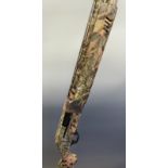 Escort Magnum 10 shot 12 bore semi-automatic shotgun with dipped camouflage paint finish,