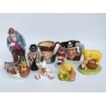 A quantity of ceramics to include Royal Crown Derby duck paperweight, Royal Doulton character jugs,