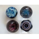 Four Caithness Glass limited edition Colin Terris designed paperweights Space Flower 77/100,