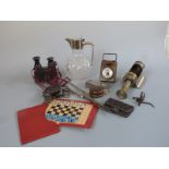 A vintage travelling chess set, hallmarked silver mounted purse, fold out Busch Winette binoculars,