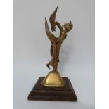 A pair of Indonesian or Thai brass figures of winged deities mounted on wood plinth bases,