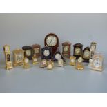 Nineteen miniature clocks including brass examples, bracket clocks,
