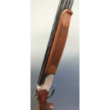 Lanber 12 bore over and under ejector shotgun with scrolling and bird engraving to the lock,