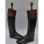 A pair of leather riding boots with Pearl & Co London trees,