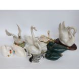 A group of ceramic swans and ducks to include Beswick, Lladro,