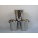 Three stainless steel champagne ice buckets