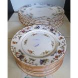 A quantity of Royal Worcester dinner and tea plates with Chinese style decoration