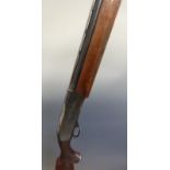 Remington model 1100 12 bore semi-automatic shotgun with ornately carved semi-pistol grip and