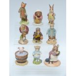 Nine Beswick Beatrix Potter figures including Mr Jeremy Fisher Digging, Yock-Yock in the Tub,