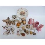A quantity of collectable ceramics to include Wade animals,