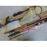 A collection of vintage fishing rods including Ron Thompson spin,