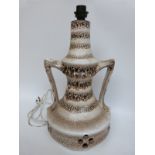 A large retro West German pottery lamp with lava decoration,