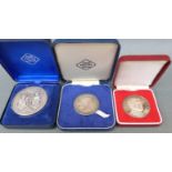 Two cased John Pinches of London silver Royal commemorative medal coins,