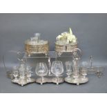 Seven various silver plated cruet or bottle stands and glasses