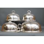 A graduated set of three Walker & Hall silver plated meat or serving domes,