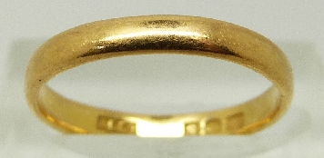 A 22ct gold ring/ wedding band, maker AC Co, size M, 2.