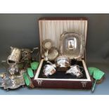 A cased silver plated tea set, further plated ware including pierced basket, tea ware,