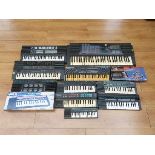 A collection of various Yamaha electronic keyboards to include PSR-180,