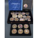 A collection of gold plated Royal commemorative picture coins etc.