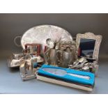 A quantity of silver plated ware including toast rack, tray, hallmarked silver handled cake slice,