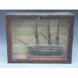 A possibly prisoner of war model of a Napoleonic era ship with rigging and bone or similar fittings,