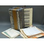 Estrella German made 24 bass piano accordion in blue pearloid finish with matching sharp keys in