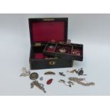 A collection of jewellery to include silver earrings, silver ring, Victorian swallow brooch,