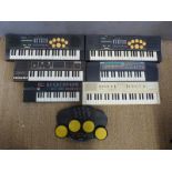 A collection of various Casio electronic keyboards to include Casiotone MT520, MT60 etc.