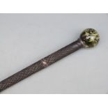 A 19thC walking cane with chequered detail and hardstone spherical knop