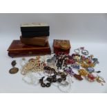 A collection of jewellery including beaded necklaces, marcasite, white metal coins and necklace,