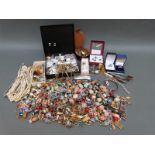 A collection of costume jewellery including beads, necklaces, earrings, cufflinks,