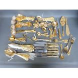 A quantity of gold plated cutlery and various boxed sets of cutlery