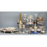 A collection of silver plate including platters, goblets, trophies,