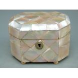 A 19thC mother of pearl tea caddy raised on ball feet, H 8.5cm, L 14.