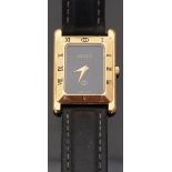 Gucci 4200 FL wristwatch with gold hands, black face, Roman numerals to the bezel,