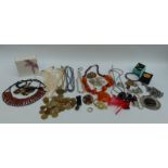 A collection of costume jewellery including necklaces, brooches, filigree brooch, silver earrings,