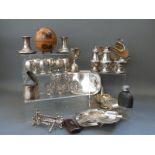 A quantity of silver plated items including sugar scuttle, candlesticks,