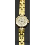 Tudor Royal gold plated ladies wristwatch, ref A2100, with black hands, gold Arabic numerals,