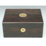 A 19thC coromandel wood workbox with brass inlaid decoration and mirror to interior of lid,