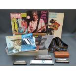 A collection of music tutor books to include harmonica, together with a Meisterklasse Hohner 580,