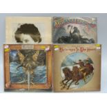 Approximately 100 mostly rock albums including Led Zeppelin, The Beatles, Jethro Tull, Neil Young,