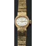 Rotary 9ct gold ladies wristwatch with two-tone gold and black hands and baton markers,